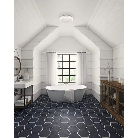 Modern bathroom with Saturn Decorative Bathroom Ventilation Exhaust Fan With Light 80 CFM Satin White Frosted Glass Enclosure on ceiling.