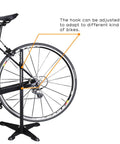 Adjustable Floor Bicycle Stand For Indoor Storage With Easy Hook Design Fits Seat Stay And Chain Stay next to bicycle rear wheel