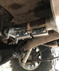 Four Pack 2.5 Inch Stainless Steel Butt Joint Exhaust Clamp Band Sleeve installed on exhaust system under vehicle