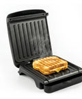 Ovente Two Serving Electric Indoor Grill And Panini Press Compact Contact Maker For Juicy Steaks Bold Smoky Flavor No Outdoor Mess Black Kitchen Appliance with grilled cheese.
