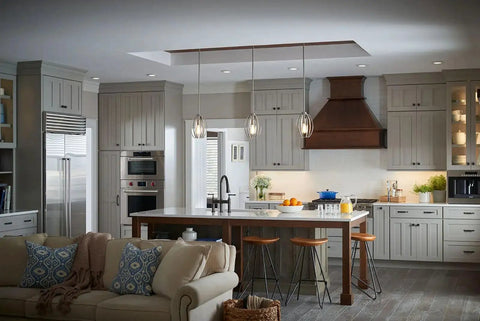Modern kitchen island with 12 Inch Kitchen Pendant Light In Brushed Nickel Finish, showcasing sleek single light fixtures.