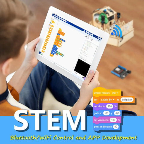 Child using IoT Smart Home Hands-On Coding Kit For Arduino Fans, Voice And App Control with tablet interface and home model