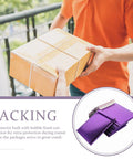 Close-up of a hand holding a package with purple mailers, showcasing 'Purple Bubble Mailers 18x23cm Self Seal Padded Envelopes'