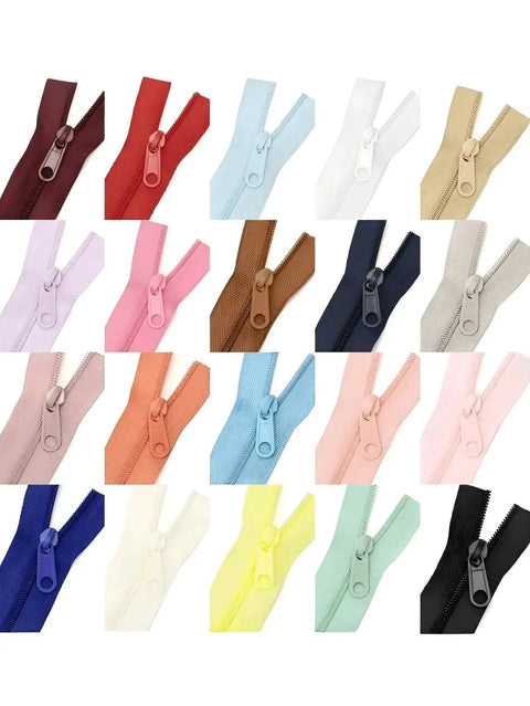 Assorted colored zipper pulls and tapes in various shades, illustrating a Complete 4.5 Meter Nylon Zipper Repair Kit with multiple options.