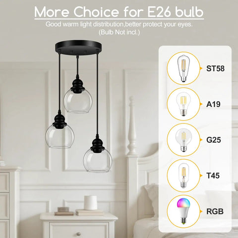 Three Light Pendant Light With Clear Glass Shades, Matte Black Finish, hanging over a nightstand, E26 base options shown