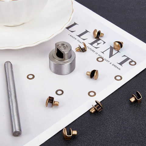 20 Piece Boot Hook Kit With Brass Shoelace Eyelets And Rivets tools set on white surface