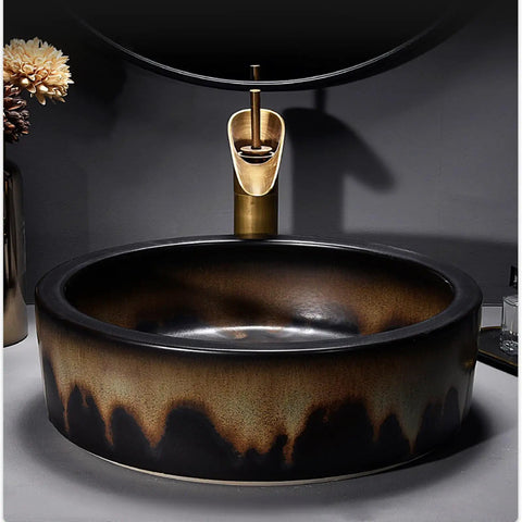 USZWBY Round Bathroom Vessel Sink with Faucet Combo 16.1" Art Wash Basin in stylish black and gold, modern design for vanity use.