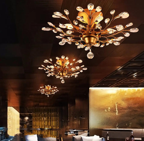 Crystal Chandelier Pendant Light With K9 Crystals, Vintage Gold Ceiling Fixture in a restaurant interior