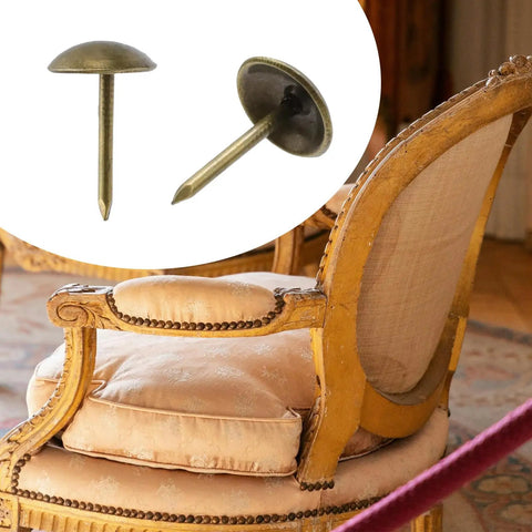Antique Brass Upholstery Tacks with 3/8 Inch Round Head Dome, used on a vintage upholstered chair with plush cushion.