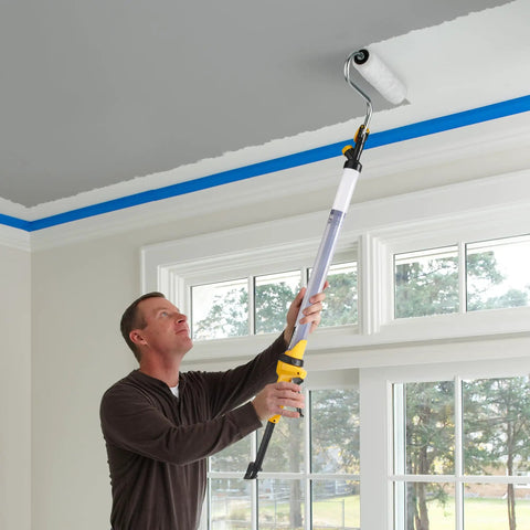 Man using EZ Roller With Long Reach Handle Holds 22 Oz In The Handle Inner Fed Paint Roller Cuts Mess And Paints Interior Walls And Ceilings 2x Faster