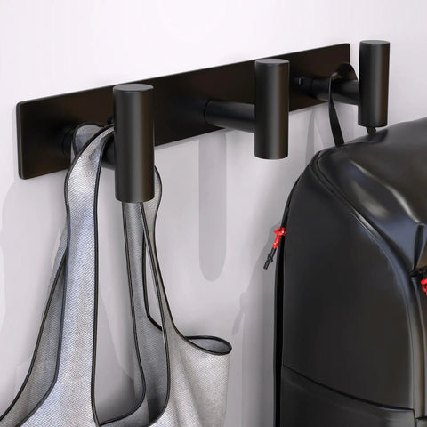 Heavy Duty Stainless Steel Wall Mounted Coat Rack With 3 Hooks Built To Last In Black Finish holding bags and a backpack