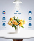 Overhead view of a 7W GU10 LED Bulbs Dimmable 5000K Daylight illuminating a vase of yellow roses on a table.