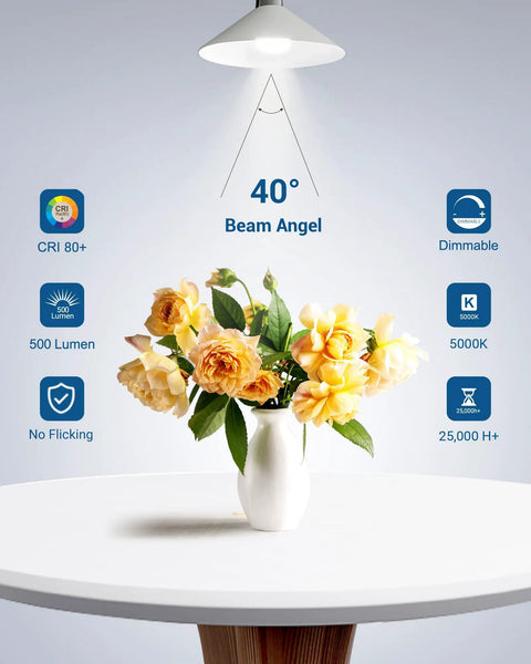 Overhead view of a 7W GU10 LED Bulbs Dimmable 5000K Daylight illuminating a vase of yellow roses on a table.