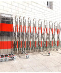 Built Different Stainless Steel Retractable Crowd Control Fence With Fast Roll Wheels Heavy Duty Expandable Mobile Safety Barrier Gate For Construction Zones Now, compactly stored.