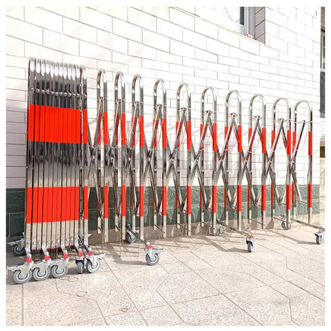 Heavy Duty Stainless Steel Retractable Crowd Control Fence With Smooth As Butter Casters For Construction Sites And Mall Entrances Durable Metal Safety Gate Roll Anywhere Ready, folded for easy transport.