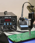 Two In One ESD Safe Desoldering Station 80W And 60W Soldering Iron With Desoldering Gun Digital Temperature Control on circuit board