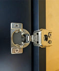 Smooth As Butter Soft Close Cabinet Hinges With 3 Way Cam Adjustment 1 1/4 Overlay And 105 Degree Open heavy-duty hinge installed on kitchen cabinet.