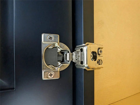 Smooth As Butter Soft Close Cabinet Hinges With 3 Way Cam Adjustment 1 1/4 Overlay And 105 Degree Open heavy-duty hinge installed on kitchen cabinet.
