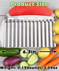Suuker large stainless steel crinkle cutter with red handle; front view with potatoes, cucumbers, and carrots.