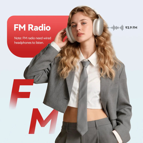 Person wearing over-ear headphones tuned to FM radio, suited in gray. Note: FM radio requires wired headphones.