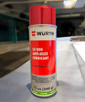 Wurth CU 800 Copper Anti Seize Lubricant, 12 Oz Heavy Duty Pro Grade Aerosol can on a table in an industrial setting.