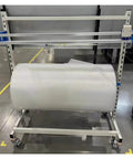 Badass Heavy Duty Steel Bubble Wrap Dispenser Stand With Razor Edge Cutter and Automatic Tension Brake, featuring large bubble roll.