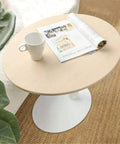 Adjustable Height Rolling Laptop Stand With Spacious Work Surface Smooth Caster Wheels Portable Computer Desk For Bedroom Living Room And Home Office Kick Back Ready Workstation featuring a white mug and a magazine on a round wooden tabletop.