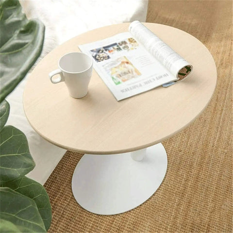 Adjustable Height Rolling Laptop Stand With Spacious Work Surface Smooth Caster Wheels Portable Computer Desk For Bedroom Living Room And Home Office Kick Back Ready Workstation featuring a white mug and a magazine on a round wooden tabletop.