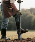 Person using 46 Inch Metal Detecting Shovel With Double Serrated Blade For Relic Hunting Gold Prospecting Landscaping And Garden Work Built With Manganese Steel Head And Carbon Handle For Rugged Outdoor Use In Rock Sand And Wet Ground