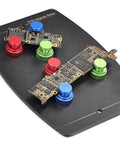 Dope Magnetic Third Hand Soldering Station For PCB Work with colorful magnetic pillars holding two PCBs on stable metal base