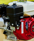 Close-up of Honda engine on 135 Psi 5.5 Hp Gas Powered Air Compressor showcasing cast iron construction and durability.