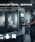Man operating 5-axis CNC machine for industrial-grade milling within ±0.02mm tolerance