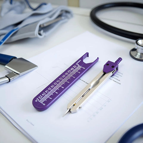 ECG Calipers Measuring Tool For Nurses And Docs, purple digital calipers and caliper divider for electrocardiograms on desk