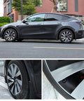 Ride Ready 4 Piece Wheel Covers For Tesla Model Y Juniper 19 Inch Killer Spiral Aero Hubcaps sleek black design on vehicle.