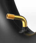 Close-up of 4.10/3.50-6 inner tube with TR87 bent valve stem for go karts, showing the brass valve detail.