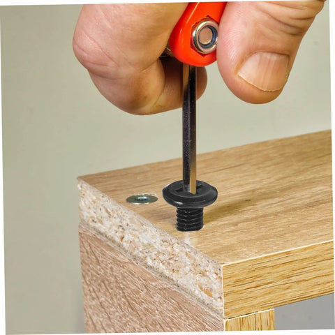 Person using hex key to tighten steel bolt in wooden panel from Bulk 170 Piece Steel Furniture Hardware Kit Rock Solid Screws And Nuts.