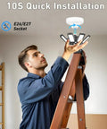 Man installing Hella Bright 240W LED Garage Light With 24000 Lumens 6500K Daylight Ceiling Fixture With 8 Plus 1 Deformable Panels