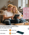 Dope Dog Paw Print Watercolor Bedside Lamp With 3 Way Dimmable Touch Control And Built In Charging Station on a table