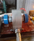 Powerful Portable Micro Hydro Generator 2KW 220V for Home Backup, showing aluminum casing and wires on wooden plank.