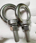 Beefy Heavy Duty M12 Eye Bolt Set, 304 Stainless Steel Shoulder Eyebolts With Nuts And Flat Washers, close-up on hand
