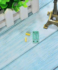 X9C103S Digital Potentiometer Module For Arduino Four Piece Set with connector pins on a wooden surface.