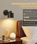 Lightess Battery Powered Wall Sconces Set of Two Black with Remote Control mounted beside bedside with USB rechargeable bulb.