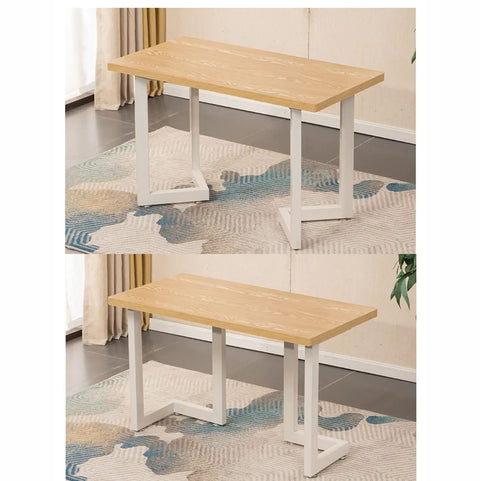 Built Like A Tank Industrial Dining Table Legs Heavy Duty Matte Black Steel Furniture Base With Adjustable Leveling Feet and Wood Floor Pads For Desk Or Living Room Setup shown with light wood top on a patterned rug.