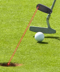 Premium Golf Putter Laser Pointer Putting Trainer aiming at hole with red beam and golf ball on green grass.
