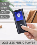 Hand holding Compact Portable MP3 Player With 1.8 Inch LCD Display Multifunction Music Player Earphones Included Built In Photo