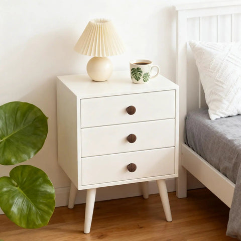 12 Pack Round Walnut Wood Drawer Handles 1.53 Inch Single Hole Cabinet Knobs with screws on white dresser beside bed.