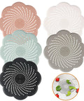 Five Pack Flower Shaped Silicone Hair Catcher Shower Drain Cover With Strong Suction Cups in assorted colors for kitchen and bathroom.