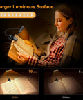 Gritin rechargeable book light clipped to an open book with 19 LEDs and flexible gooseneck (front view).
Gritin clip-on reading lamp with 19 LEDs and bendable neck, black plastic body on book (side view).
Close-up of Gritin 19-LED clip light showing compact black housing and adjustable neck.