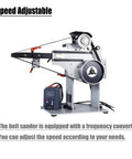 Heavy Duty Variable Speed Belt Sander And Knife Grinder Featuring Wheel Plus Flat Platen Tool Rest For Metal And Wood Polishing 1500W Motor 220V Rock Solid Reversible Workbench with adjustable speed controls.