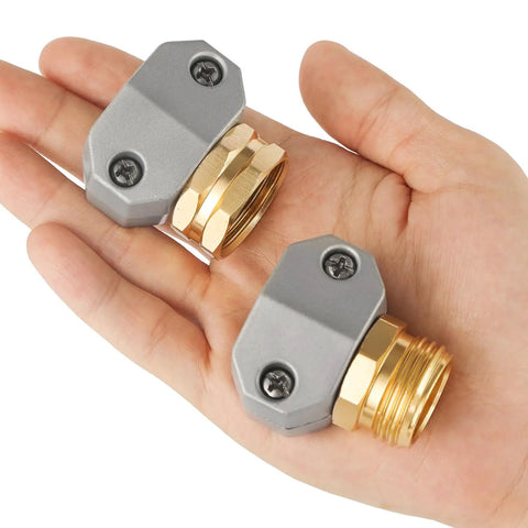 Aluminum Hose Repair Kit Set For 3/4 And 5/8 Inch Hoses With Male And Female End Fittings in a hand, zinc clamps visible